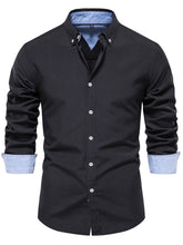 Front view of men’s black Apex Flourish quarter-sleeve button-down shirt
