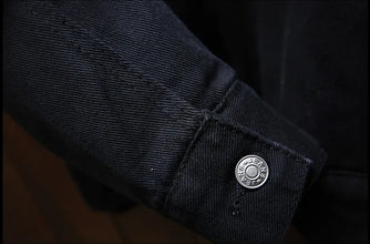Black Wool-Lined Denim Winter Jacket close up of sleeve with button cuff detail.