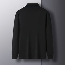 Back view of Royale Crest Fleur de Lis Polo in Black.