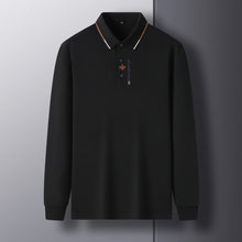 Front view of Royale Crest Fleur de Lis Polo in Black.