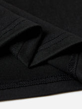 Close up view of the CaliVista Round Neck Tee's quality fabric and clean stitching in black.