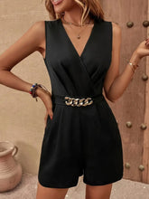 Model wearing black Chain Decor Sleeveless Romper front view.