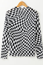 Back view of ChicGrid women’s checkered mock neck long sleeve blouse in black, on a wooden clothes hanger.