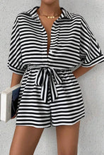 Black LineaVerra™ Romper styled for dinners, city strolls, or weekend getaways.