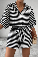 Model wearing LineaVerra™ Black Romper with ankle boots and jewelry.