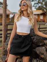 black adjustable waist denim skirt styled white top sunglasses