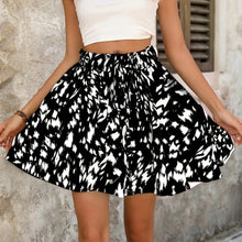Model wearing Black AurevaBoho™ Prism Ease Shorts styled with boho chic cropped top