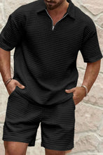 Black Azryl WaffleZip Luxe Set front view, hands in pockets.