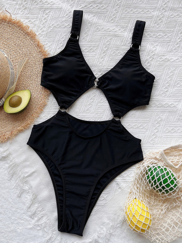 Front flat lay of black cutout plunge one-piece swimsuit with gold O-ring accents