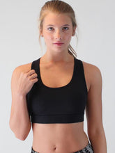 cutout scoop neck active tank front view on woman.