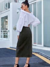Black Denivéra Button Skirt back view standing urban street-side