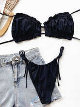 Black frill trim halter neck bikini set front flat lay view