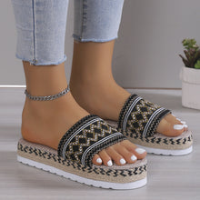 Black Open Toe Platform Sandals styled with a silver anklet and light blue jeans highlighting the woven zig zag detail.
