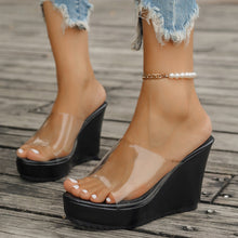 Model wearing black open toe Wedge Sandals paired with a white pearl bracelet