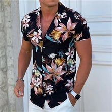 Model wearing Black Plumeria  Tropicscape Breeze Hawaiian Button-Up in vibrant floral print, front view.