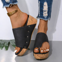 Model wearing PU Leather Wedge Sandals in black