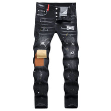 Front view of Ravexen Patchwork Distressed Straight Jeans in black, highlighting washed denim, paint splatter, and thigh patchwork design.