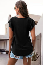 black ruffled round neck cap sleeve blouse back view
