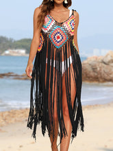 Black Solanyra fringe cascade cover-up dress close up front profile beachside