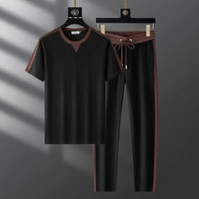 black solynex trimflex summer set front view on hanger
