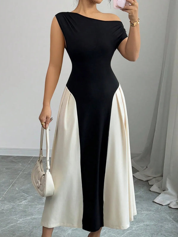 Model front view wearing Black TéMiraj Lumière Contrast Single Shoulder Midi Dress styled with gold hoop earrings and white square open-toe heels.