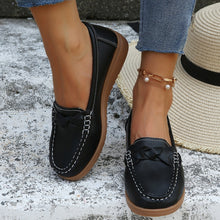 Black Weave Wedge Heeled Loafers walking front shot