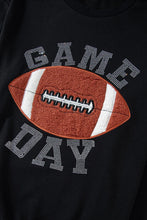 close up photo of the embroidery graphic design detailing on the Blitzelle™ GAME DAY Football long sleeve shirt
