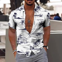 Model wearing Blue Palm Tropicscape Breeze Hawaiian Button-Up in classic palm tree print, front view