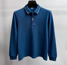 Front view of Royale Crest Fleur de Lis Polo in Blue.