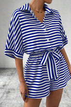 Model wearing LineaVerra™ Blue Romper with sneakers and crossbody bag.