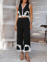 Model in black Xyvello Set styled with heels and jewelry