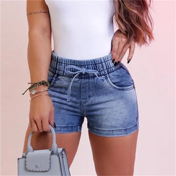 Model front pose wearing blue Denivibe™ AuraCurve Denim Shorts with drawstring waistband