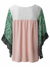 Back view of the BlossomEase Blouse in blush pink, featuring floral three-quarter sleeves and soft cotton blend.