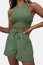 Model in matcha green Boundary Babe set paired with tan slides for morning coffee runs and lounging.
