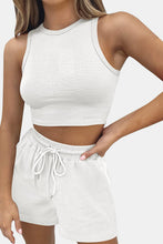 Model styled in white Boundary Babe set with nude sandals for backyard hangs and brunch dates.