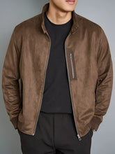 Brown Men’s Luxe Suede Stand Collar Jacket with ribbed sleeves and button side pockets, front model pose.