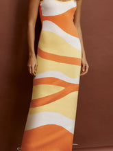 Close-up model portrait highlighting the knit and U-neckline of the Caramel Luxnometry Maxi Sweater Dress.