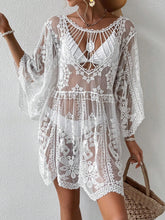Front view of Celévra Lace Round Neck Cover-Up Dress in white with delicate floral lace and zig zag hem