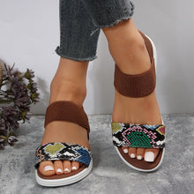 Model wearing PU Leather Open Toe Low Heel Sandals in Cerulean alligator design