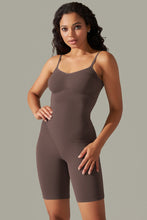 Side profile of charcoal active romper with high-stretch fabric and sculpting fit.