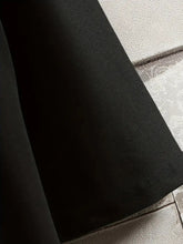 Detailed view of seam and stitching on short sleeve black ChiDrift 23 Legacy tee.