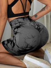 chromaluxe dark gray shorts back angle yoga pose showing fit