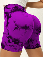 chromaluxe red-violet shorts back angle yoga pose showing fit