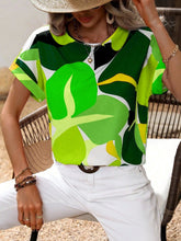 Close-up of the Neon Green blouse’s contrast trim neckline and soft, lightweight fabric texture, showcasing quality stitching and breathable material.