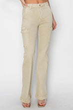 Close-up of high waist waistband button and cargo pocket on RISEN Bootcut Jeans in stone.