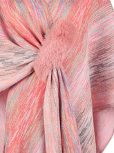 Close-up of carnation pink Heathered Fringe Hem Poncho, highlighting the soft heathered texture, multicolor contrast detailing, and pom pom fringe along the hem.