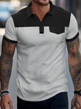 Model wearing gray ContrastEdge Waffle Polo with waffle-knit texture and contrast shoulders