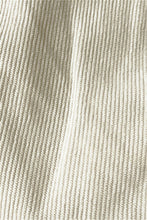 Fabric texture close-up of creamy white Cordavé CoastFlex set