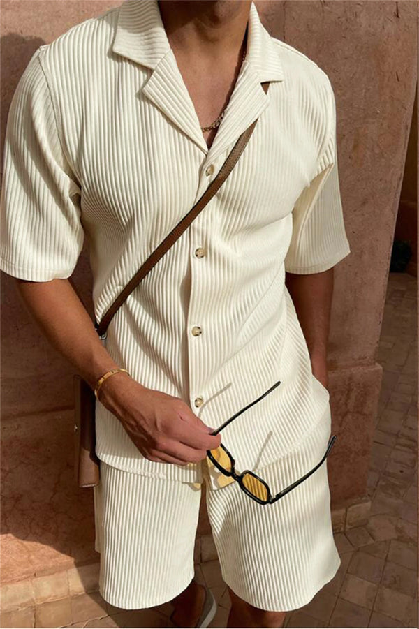 Creamy white Cordavé CoastFlex Shorts Set styled with crossbody manbag and sun glasses