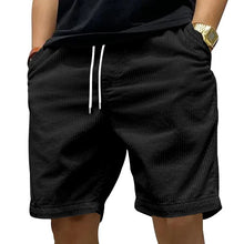 Side angle view of Cordero FiveCent Flex Cord Shorts in black.